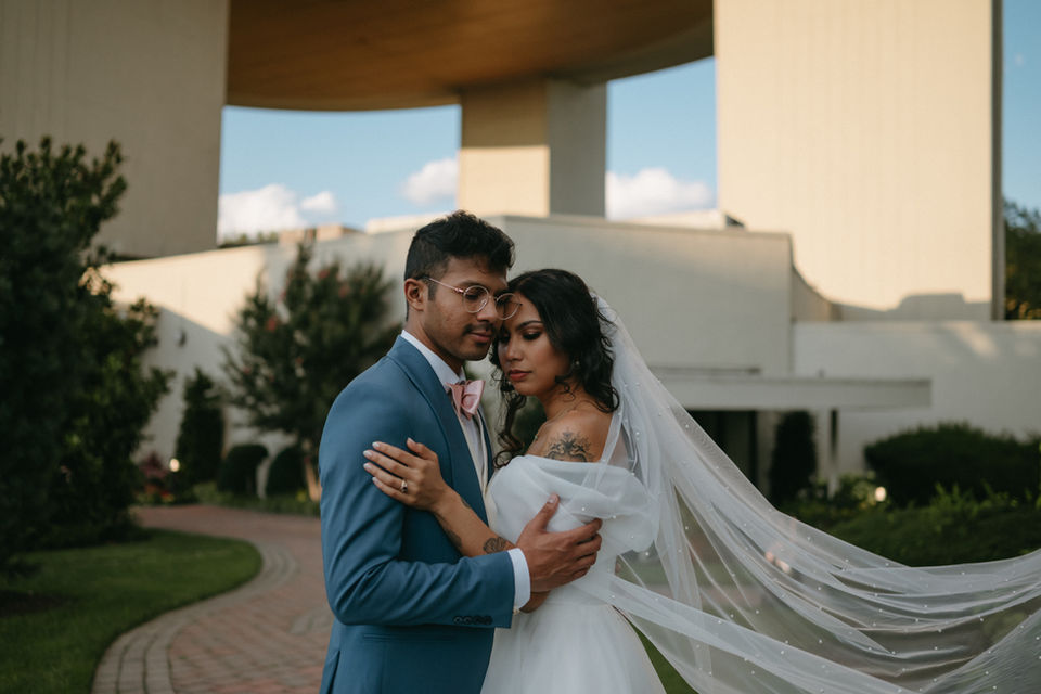 bridge and groom hugging with close eyes