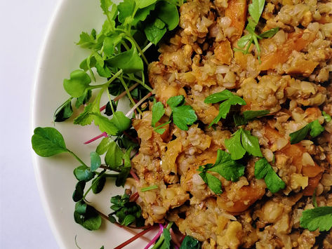 Buckwheat and walnuts on fresh sprouts