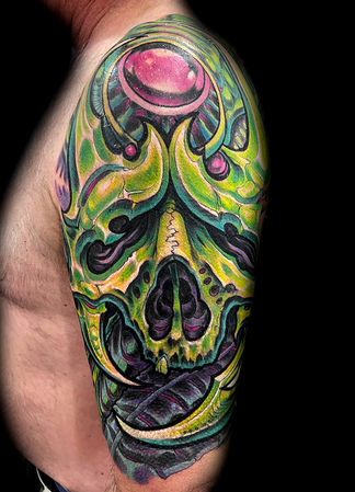 biomech skull tattoo by joe riley