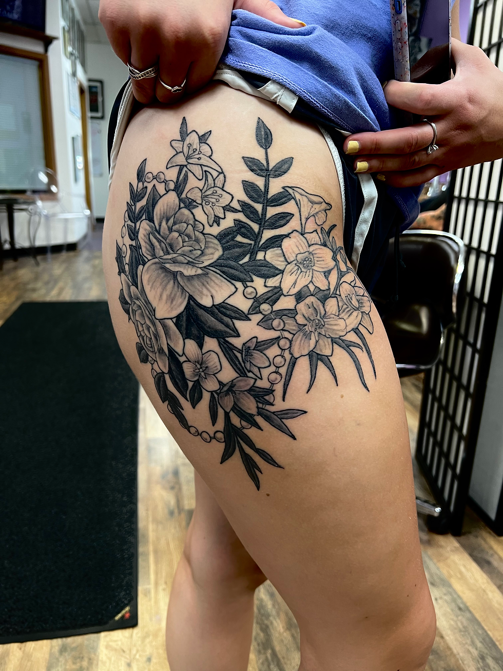 black and grey leg piece tattoo