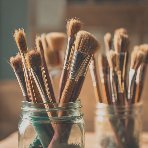 faded view of fine art brushes in a jar_edited.jpg