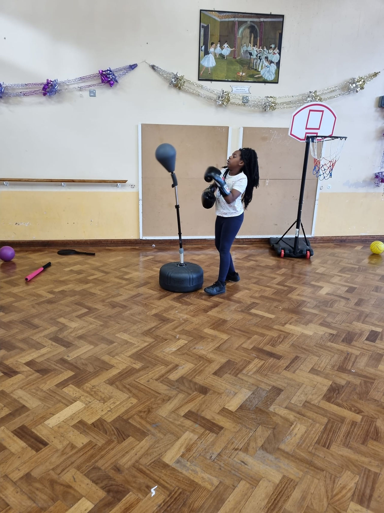 A youth member boxing at Christmas Camp 2023