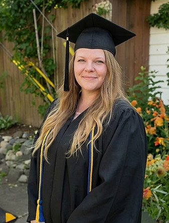 Woman in graduation cap and gown