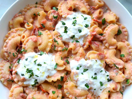Creamy Lemon & Roasted Garlic Sundried Tomato Creste di Gallo with Stracciatella & Basil