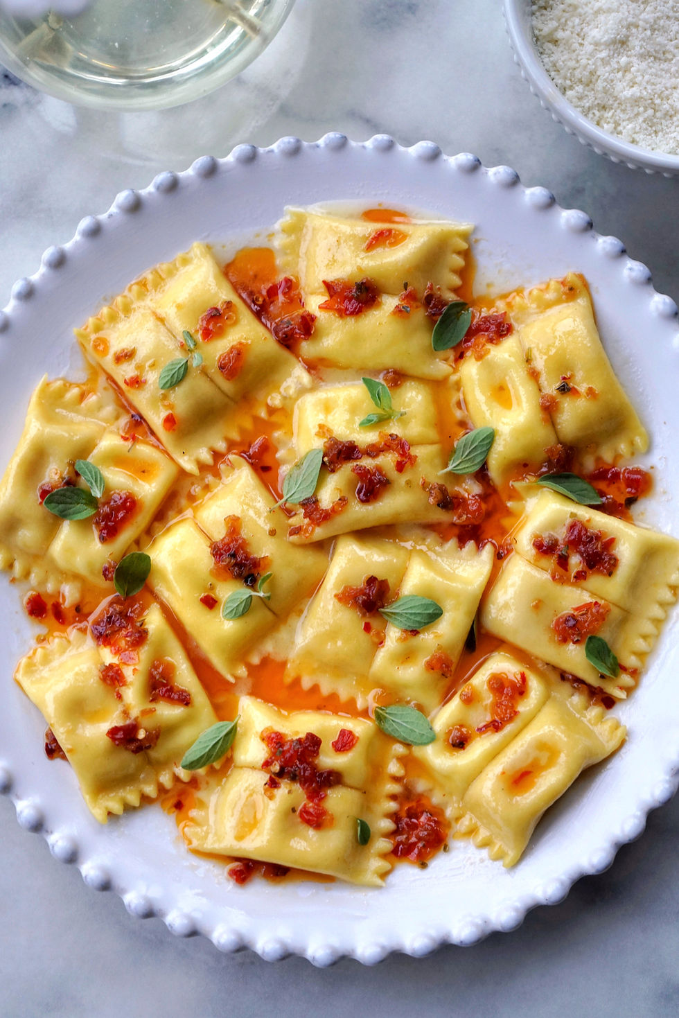 Roasted Garlic & Lemon Ricotta Ravioli Doppio with Calabrian Chili Crisp