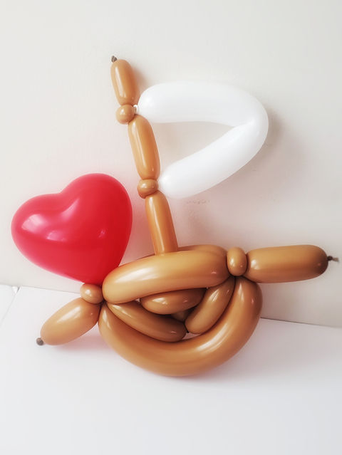 Balloonables Love Boat Balloon Animal, cute brown boat with a red heart attached