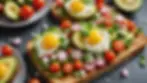 High angle view of rustic avocado toast topped with feta, radishes, and cherry tomatoes