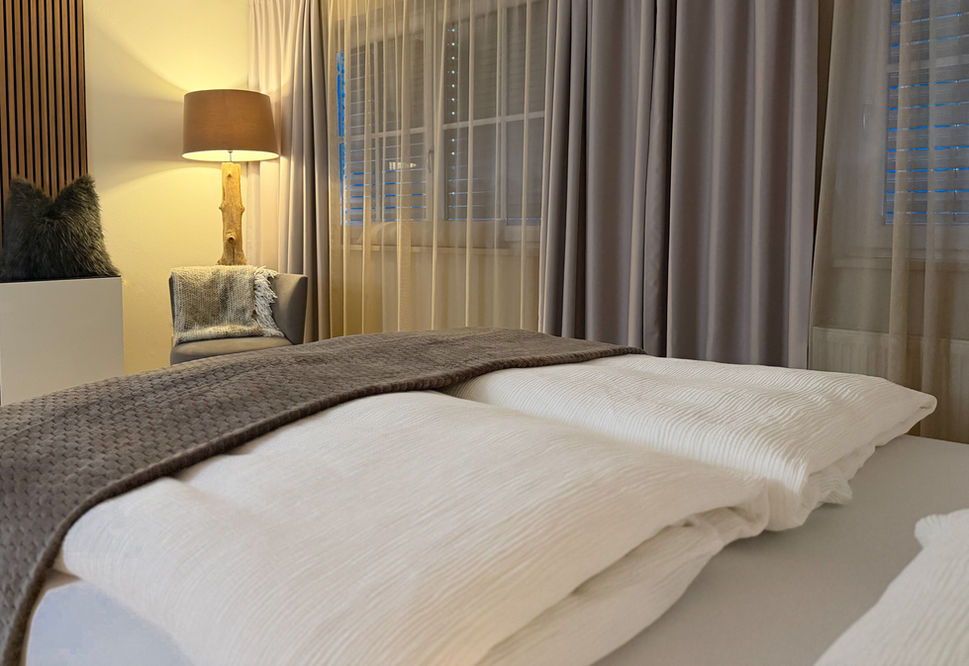 Schlafzimmer im Apartment Glücksmoment in Seekirchen am Wallersee