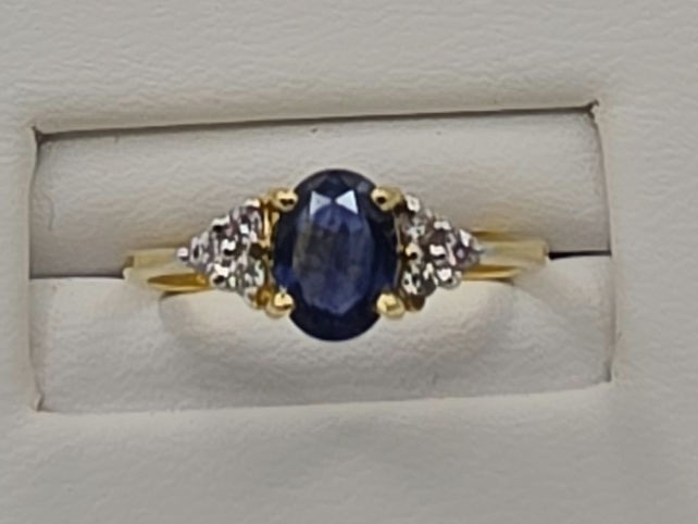 G143.  18ct yellow gold Sapphire and Diamond Ring 