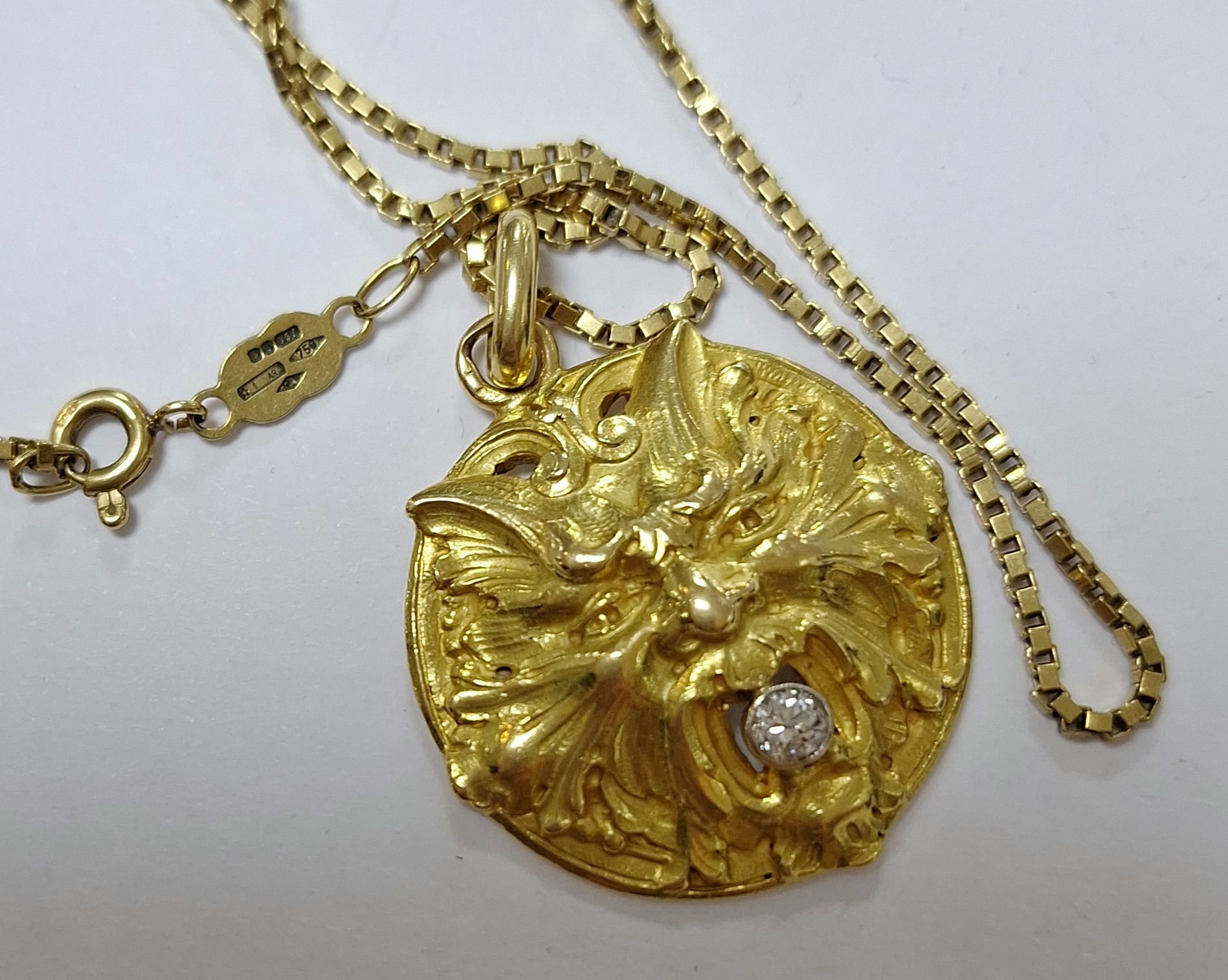 G48.  18ct Yellow Gold "Green Man" Diamond pendant & chain 