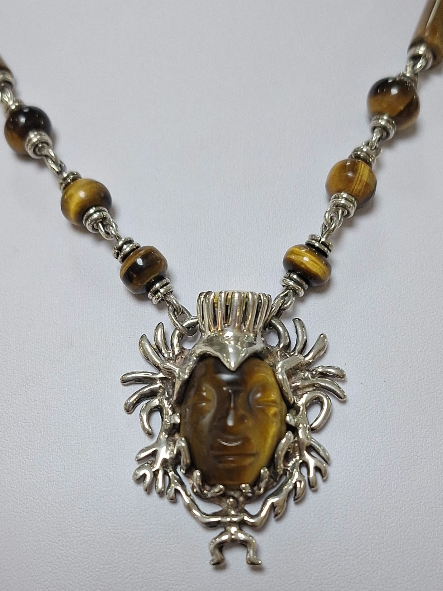 S103.  Vintage Taxco Sterling Silver and Tiger's Eye necklace 