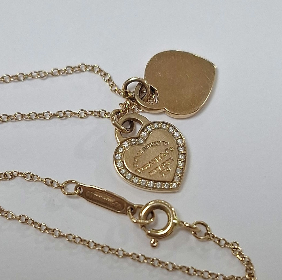 Thumbnail: G44.  Tiffany & Co 18ct rose gold mini hearts necklace 