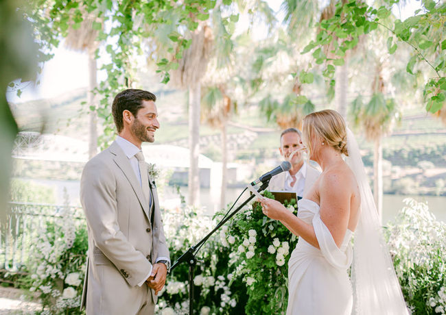 Bride reading her vows during wedding ceremony