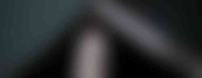 Coloured groom in light grey suit with dark grey tie