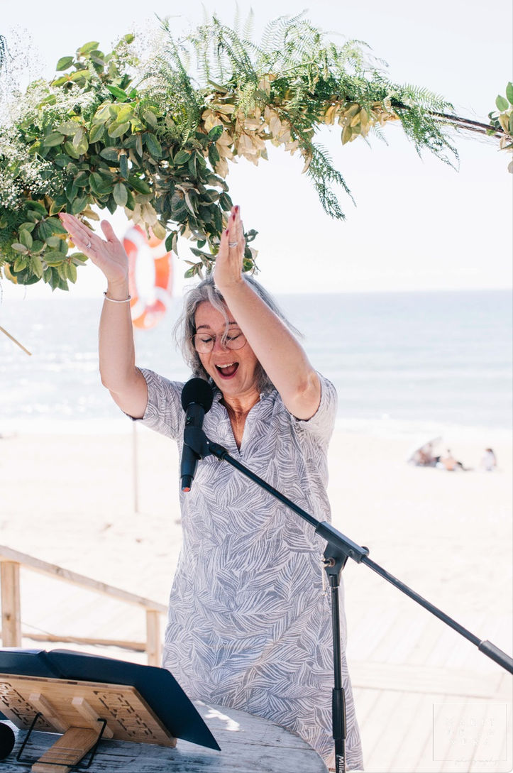 Wedding celebrant cheering