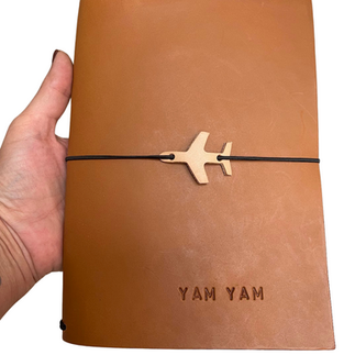 Tailored leather cover for book