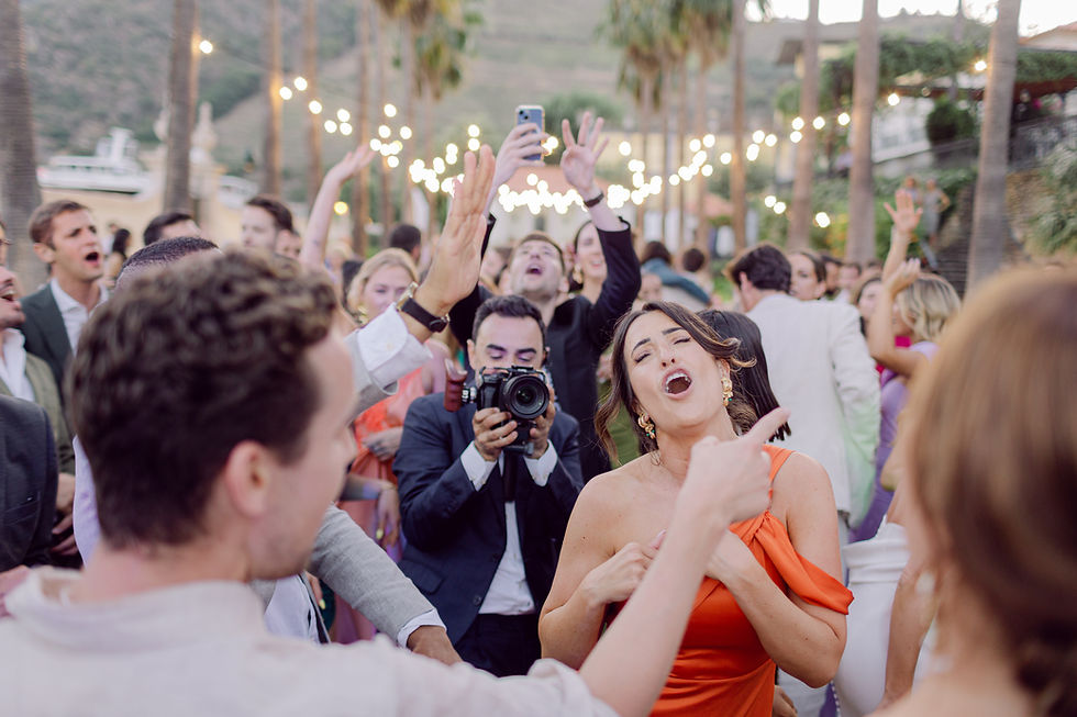 Videographer filming during a party