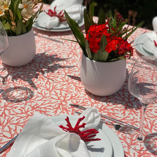 Decorated table with red flowers and details