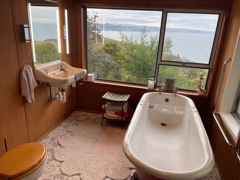 bath infront of the coastal views at whareakeake beach