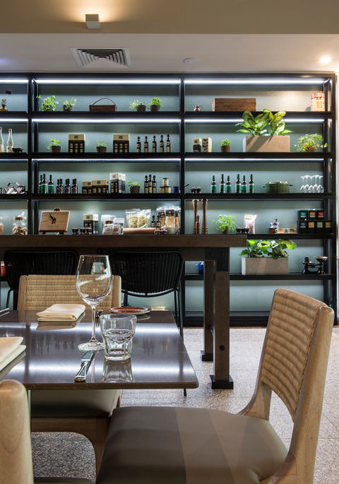 Novotel Barossa The Cellar kitchen by Saskia Beer 

Designed and manufactured by Carmody.

This project was hugely successful by the use of some very bold design elements including a ceiling wallpaper, turquoise tilework and solid onyx stone.