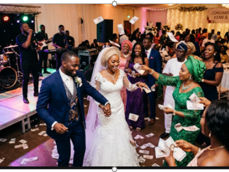 money spraying at a nigerian wedding