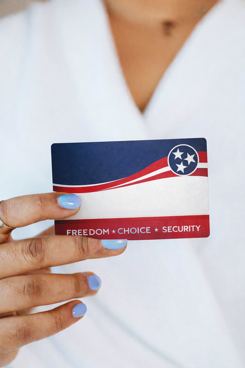 Patriotic healthcare card in hand.png