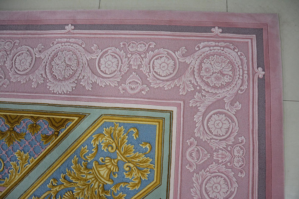 Thumbnail: Close-up of the powder pink and soft blue ornaments on the Empire Empress Collection rug.