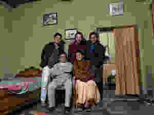 Amit with his parents, younger brother and a friend