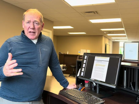 Chiropractor discussing spring back pain and injury prevention at Vogelgesang Family Chiropractic