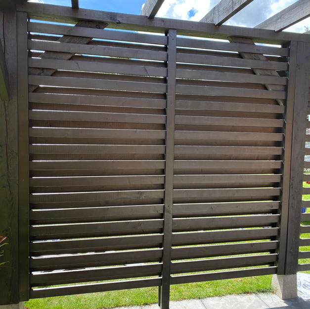 Contemporary fencing added to pergola in Ascot.