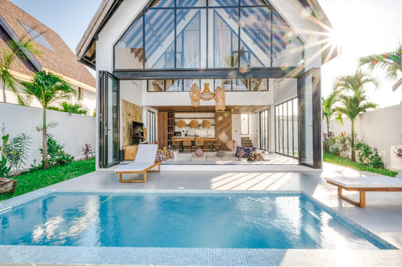 Modern tropical villa with swimming pool and open living area