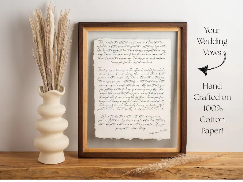 Typed wedding vow framed on wall