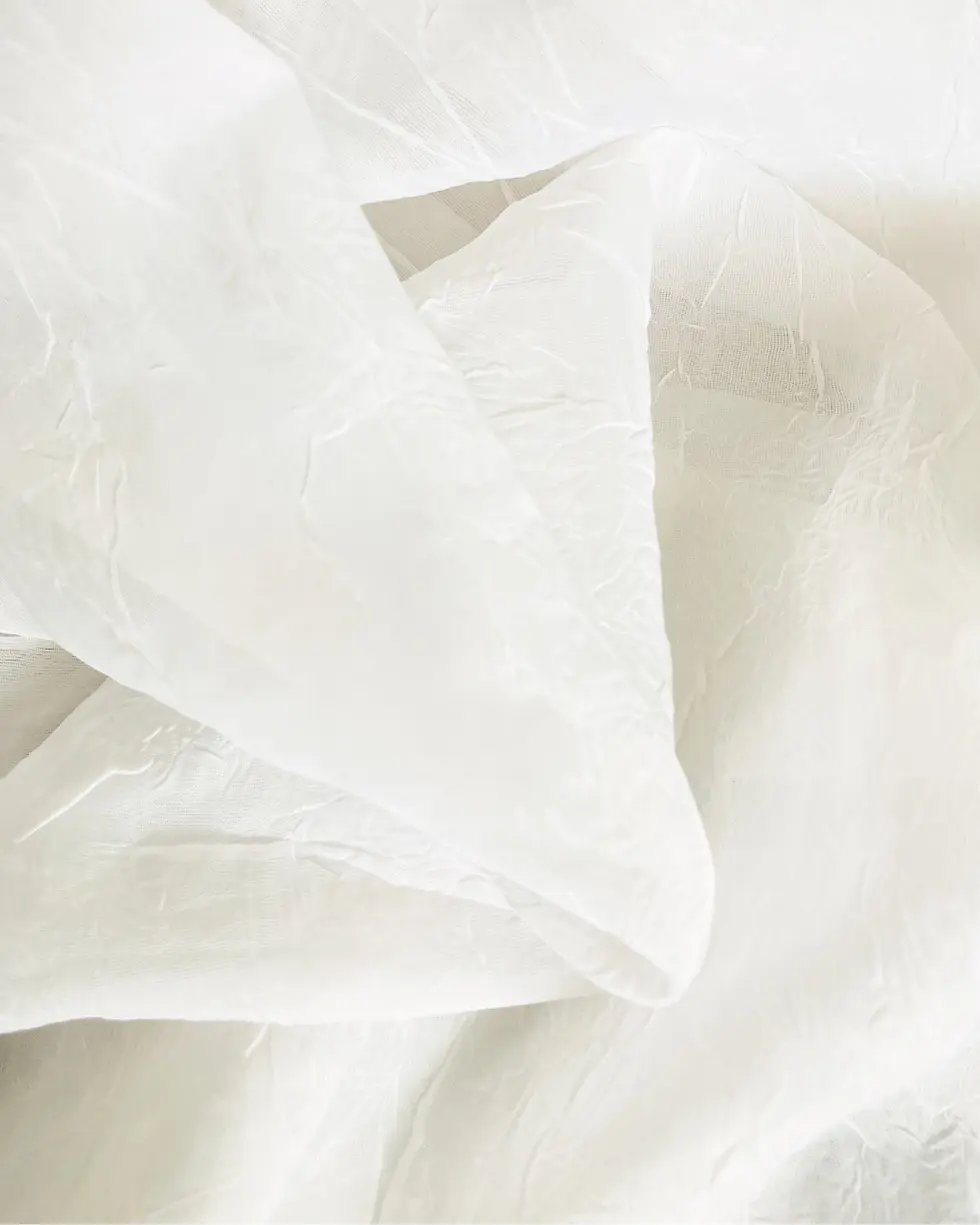 Cream linens background.webp