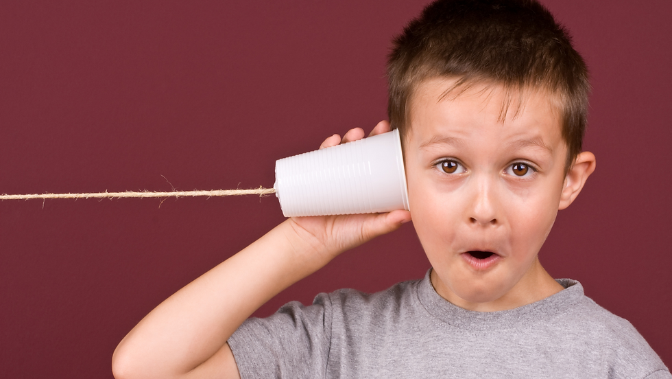boy listens carefully to all the sounds
