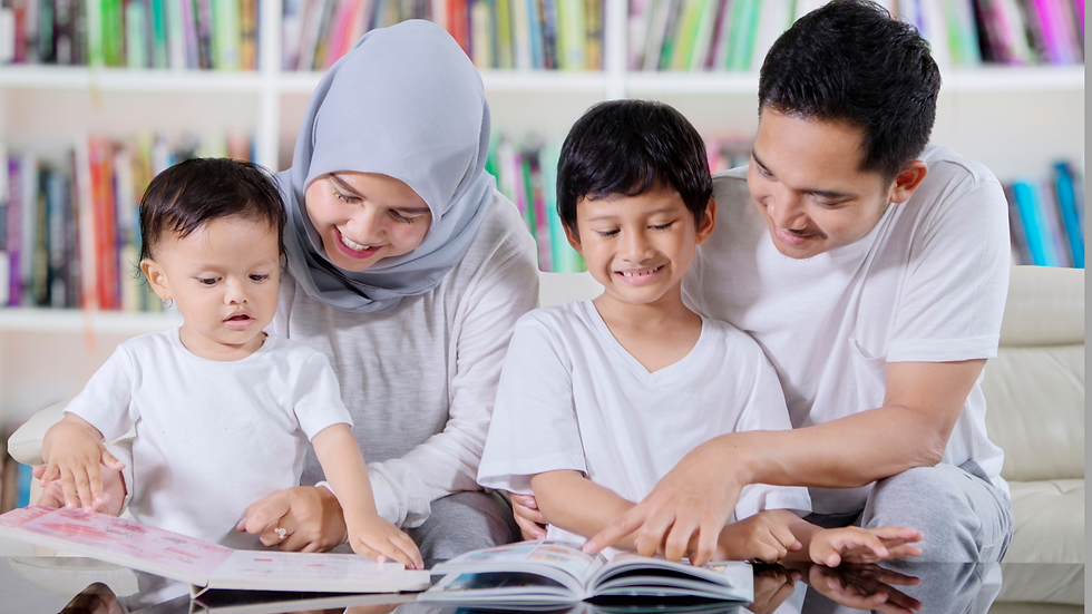 Family at the library reading together