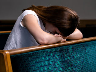 Woman dealing with church hurt