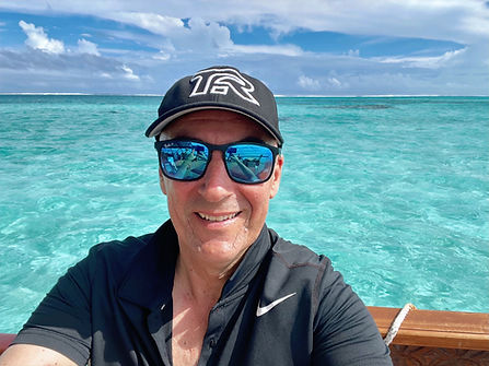 The pristine teal lagoon waters of Aitutaki lagoon