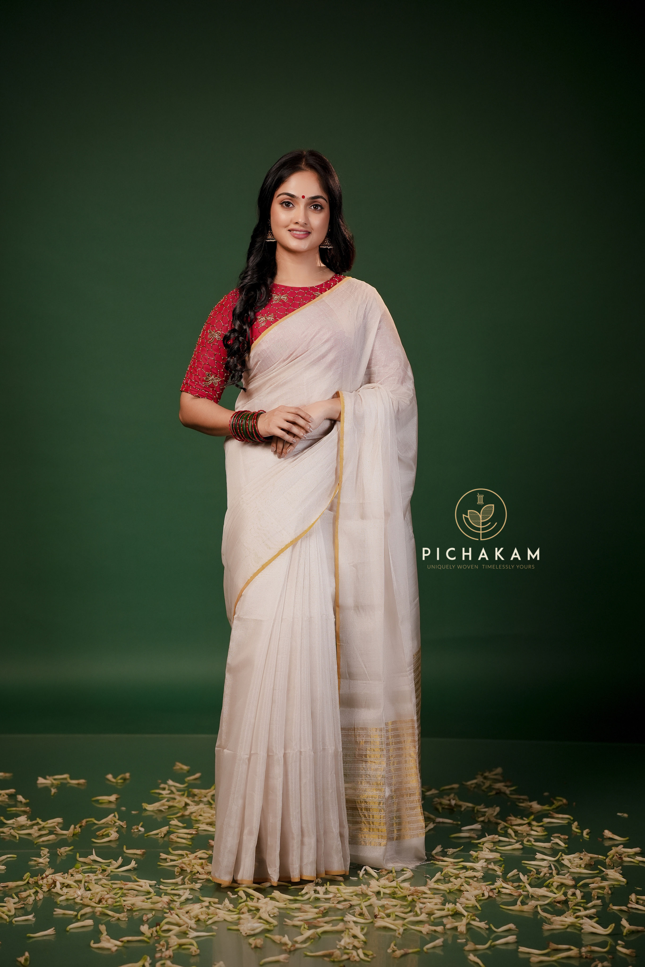 Pure handloom Silver Tissue Kasavu saree with zari lines on pallu