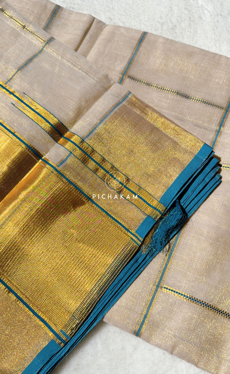 Thumbnail: Pure handwoven Tissue Kasavu saree with a delicate play of understated kattam