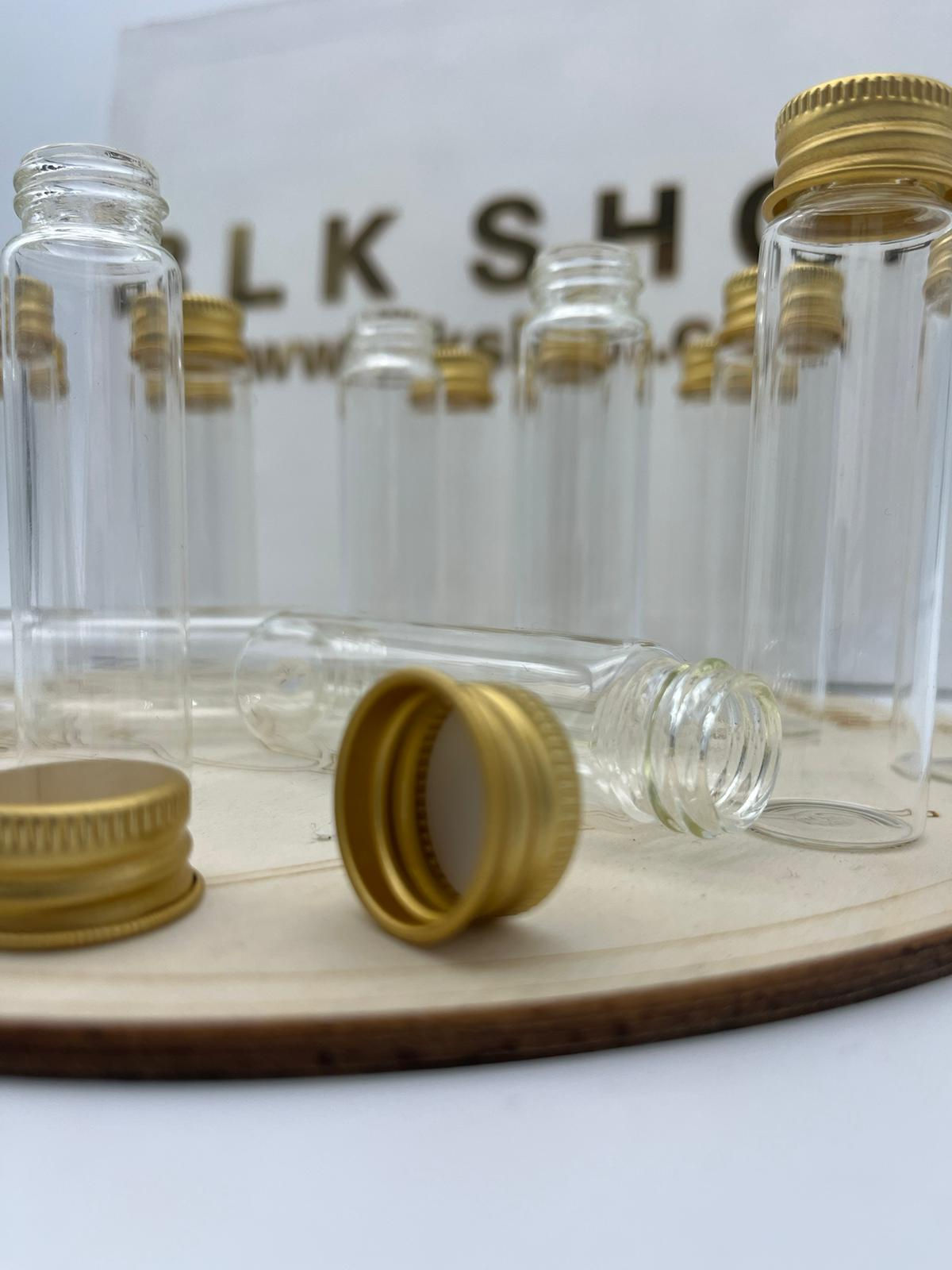 Tube à essaie bouchon doré