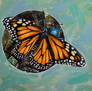 A mixed media production of acrylic paint and exotic stamps to create a monarch butterfly