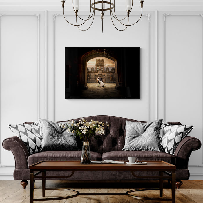 A wall art in a living room  of a couple dipping at Princeton university. 