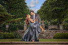 An engagement couple sharing a joyful dip at Skyland Manor in Ringwood Park. Photo Captured by Wedding Photographer George Pompilio