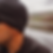 Man wearing HEAD Dry Beanie outdoors by a lake.