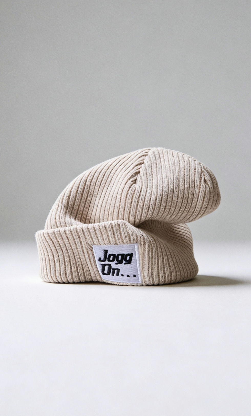 Beige Jogg On knitted beanie.
