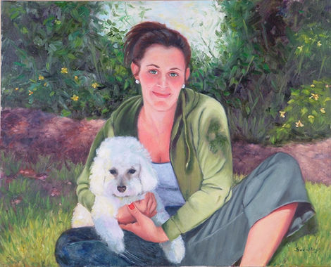 Portrait of woman with white dog