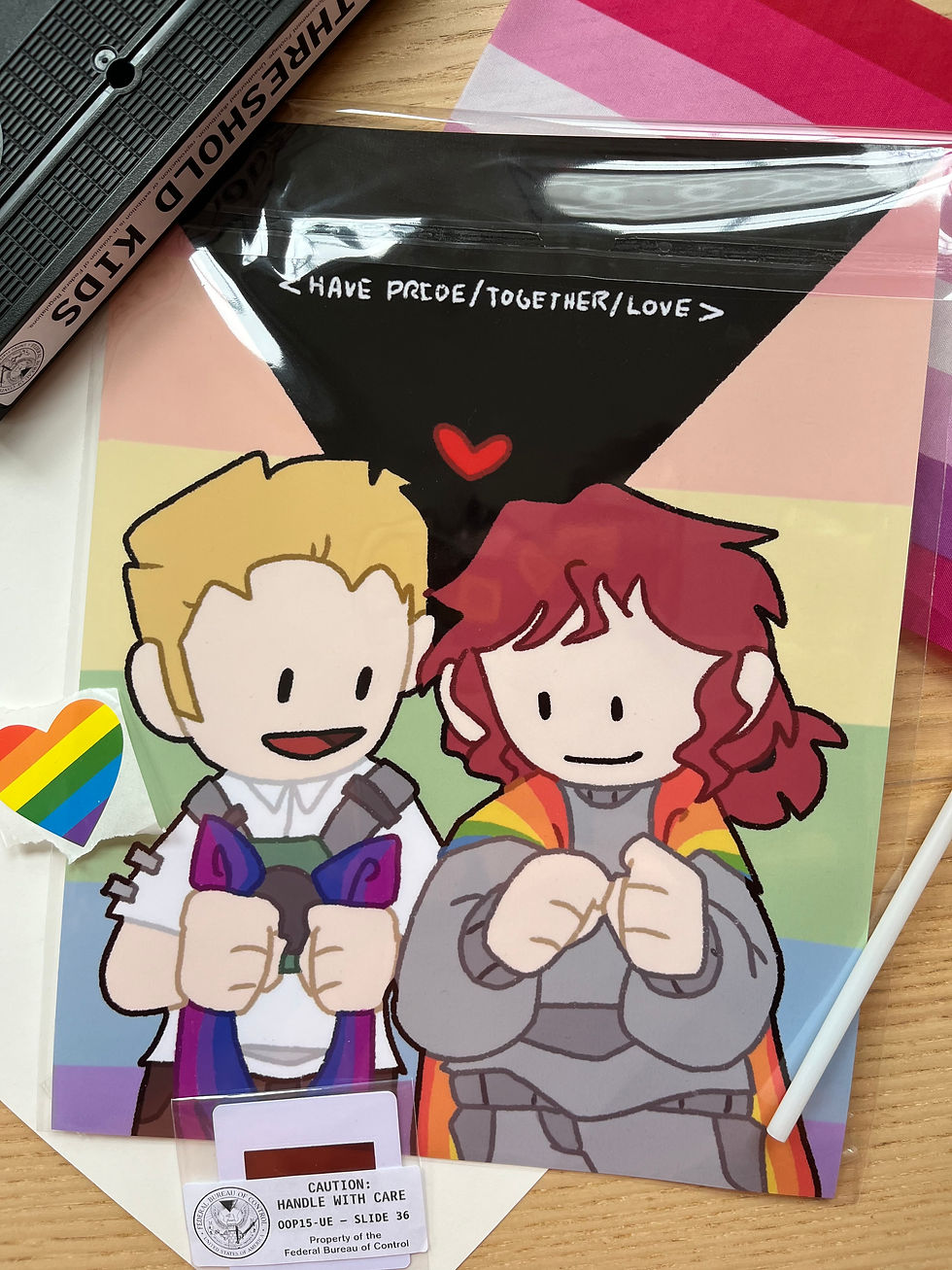 Jessie and Emily control pride print