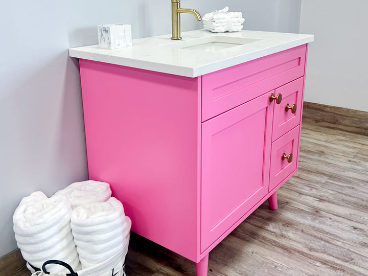 Pink Bathroom Vanity with Gold Accents