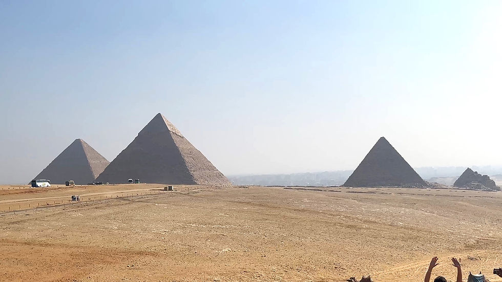 The three pyramids in the distance