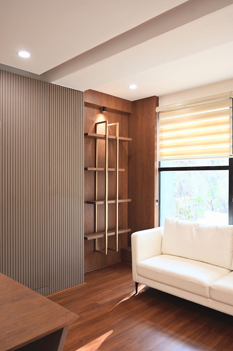 Modern interior with decorative shelving by Curves & Edges